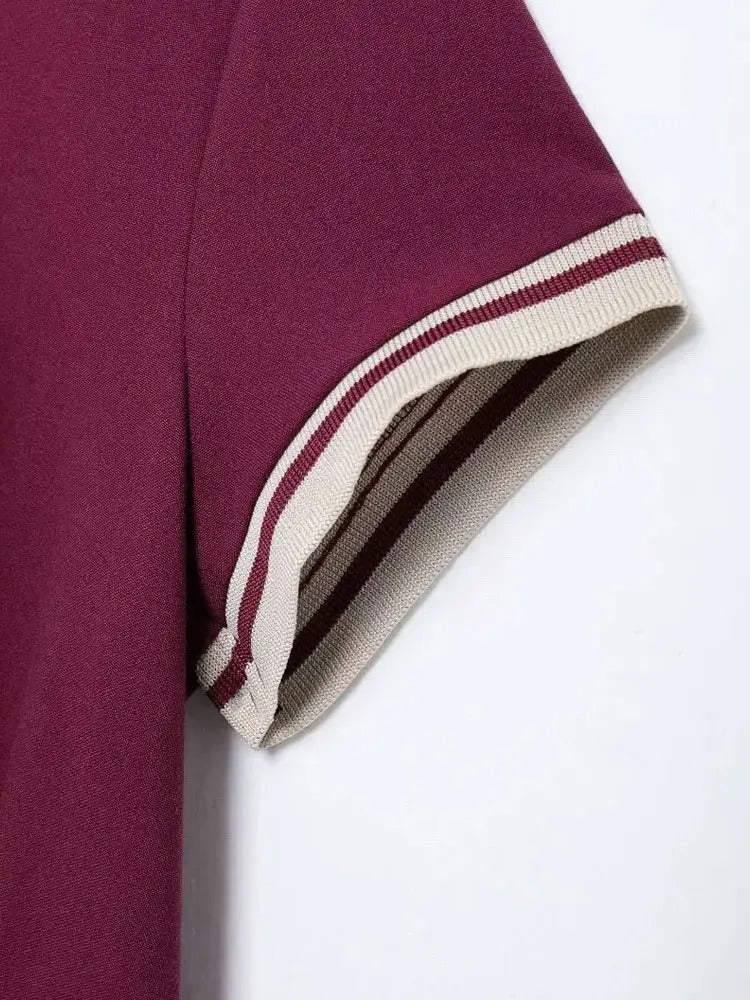 Tom Holinger | Elegantes Polokleid mit Faltenrock
