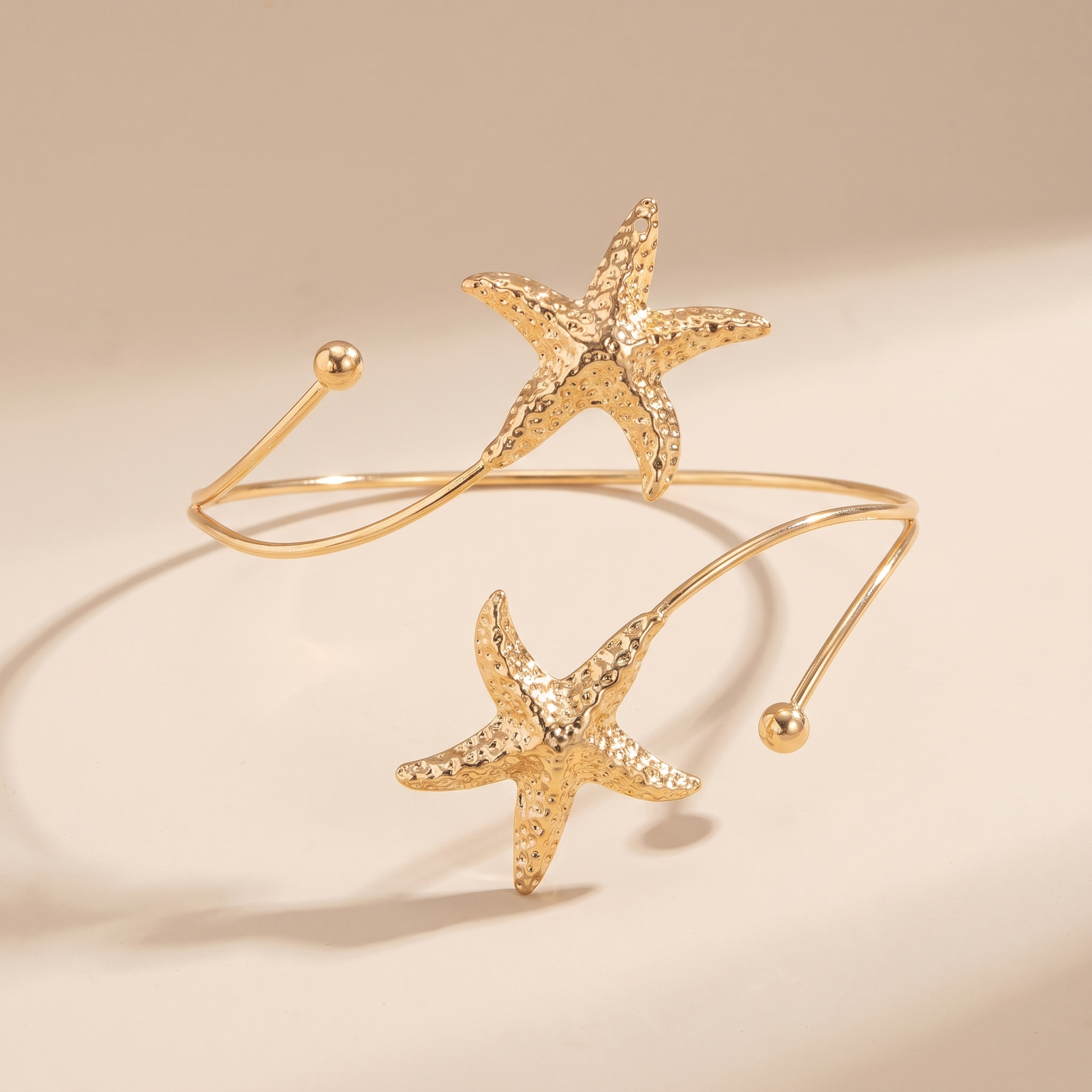 Bohemian Metal Starfish Open Arm Bracelet, studio product photo