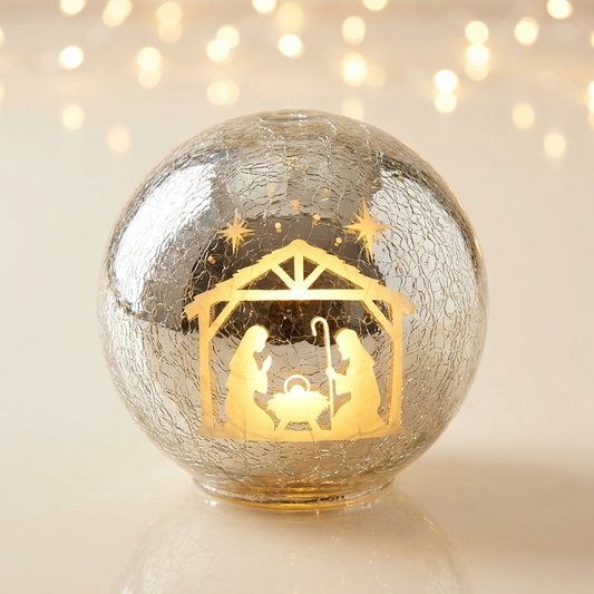 8 inch illuminated crackle glass sphere with hidden nativity scene - hero studio shot